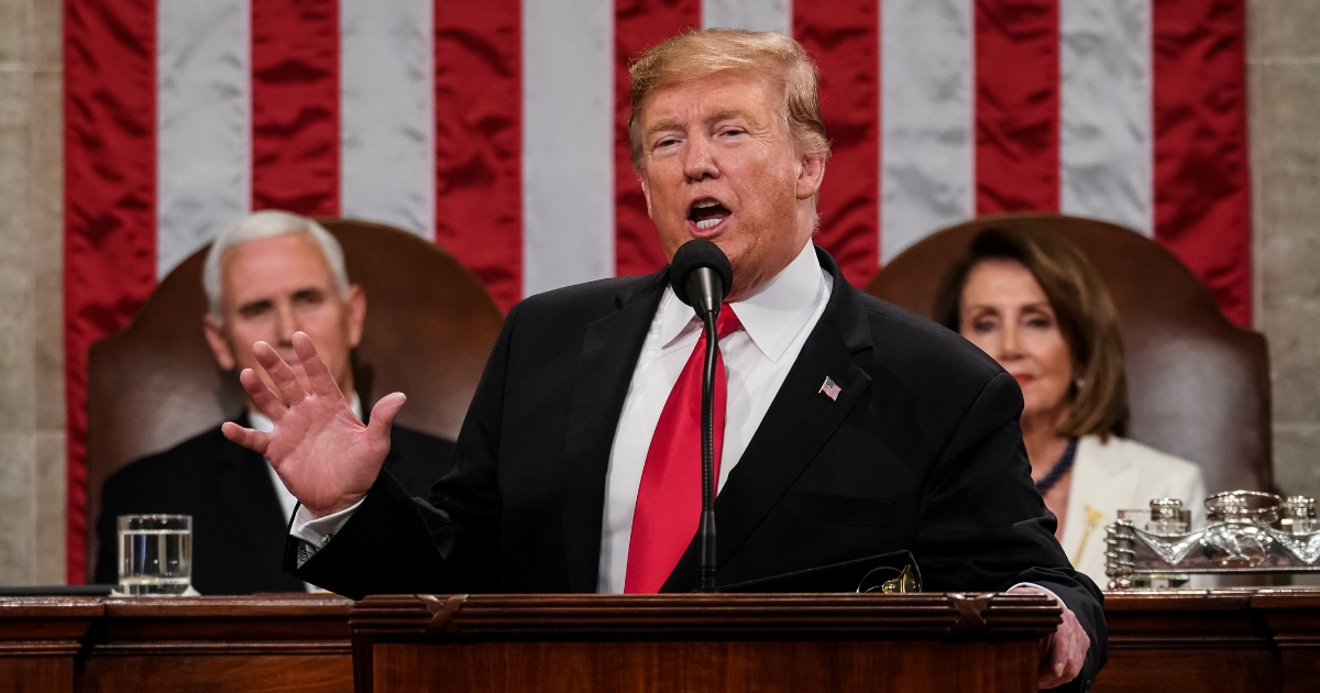 President Donald Trump, with House Speaker Nancy Pelosi and Vice President Mike Pence looking on, delivers the State of the Union address in the chamber of the U.S. House of Representatives on Tuesday.