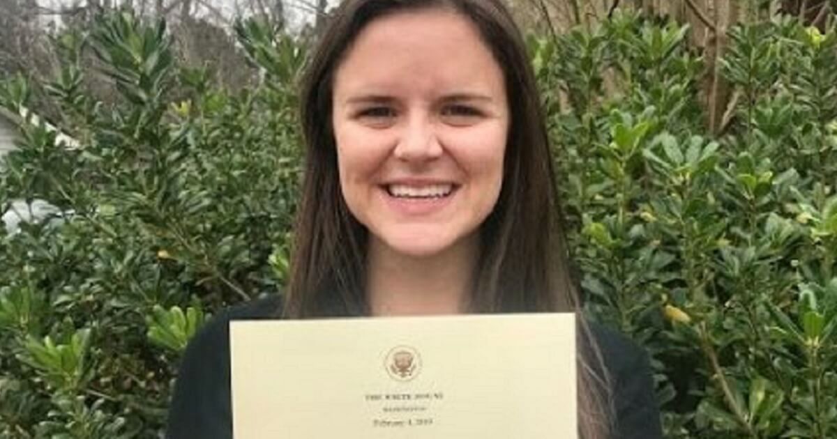 Rachel Robbins holding White House letter.