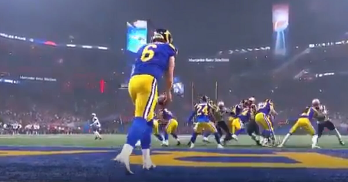 The Rams' Johnny Hekker gets ready to hit a Super Bowl record 65-yard put against the Patriots on Sunday.
