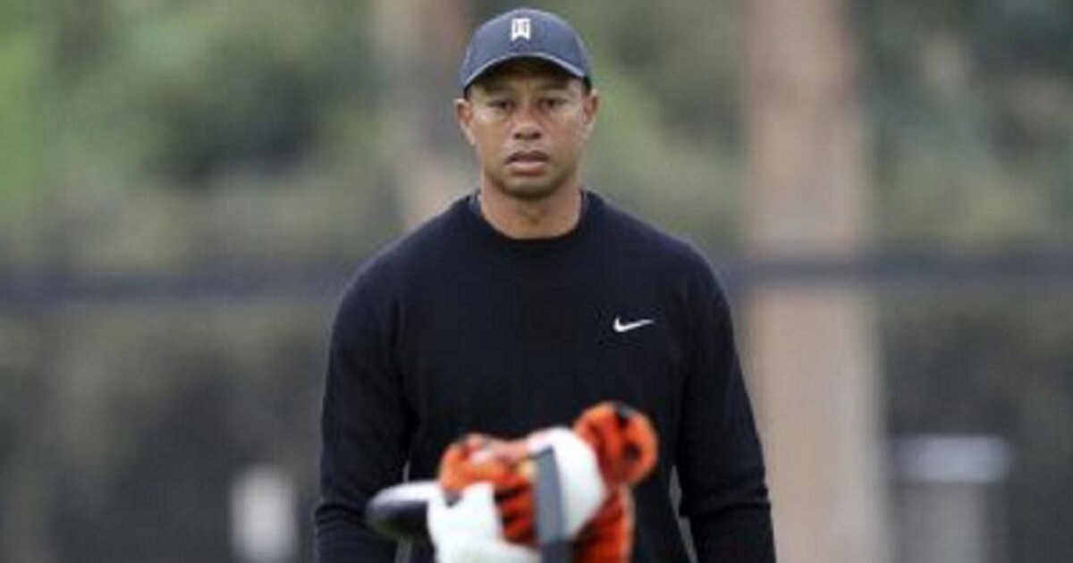 Tiger Woods walks the third green during the pro-am round at the Genesis Open golf tournament at Riviera Country Club in the Pacific Palisades area of Los Angeles on Wednesday.