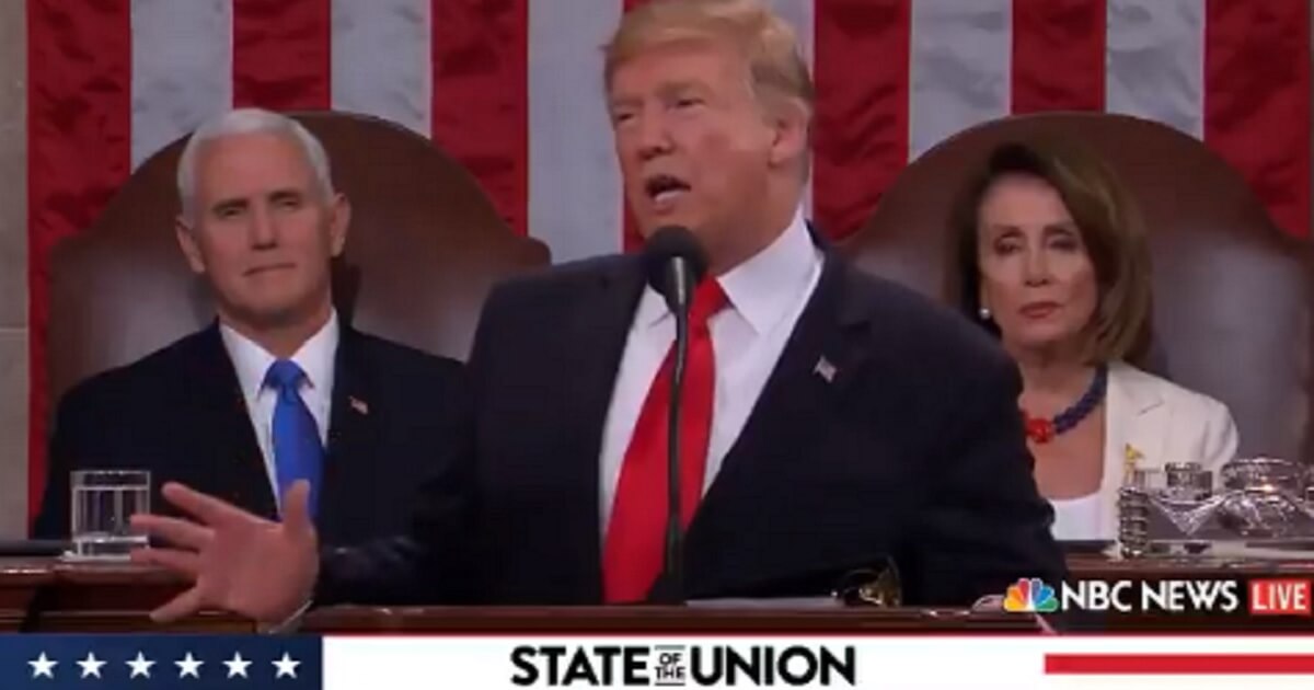 President Donald Trump introduces Matthew Charles during Tuesday's State of the Union Address.
