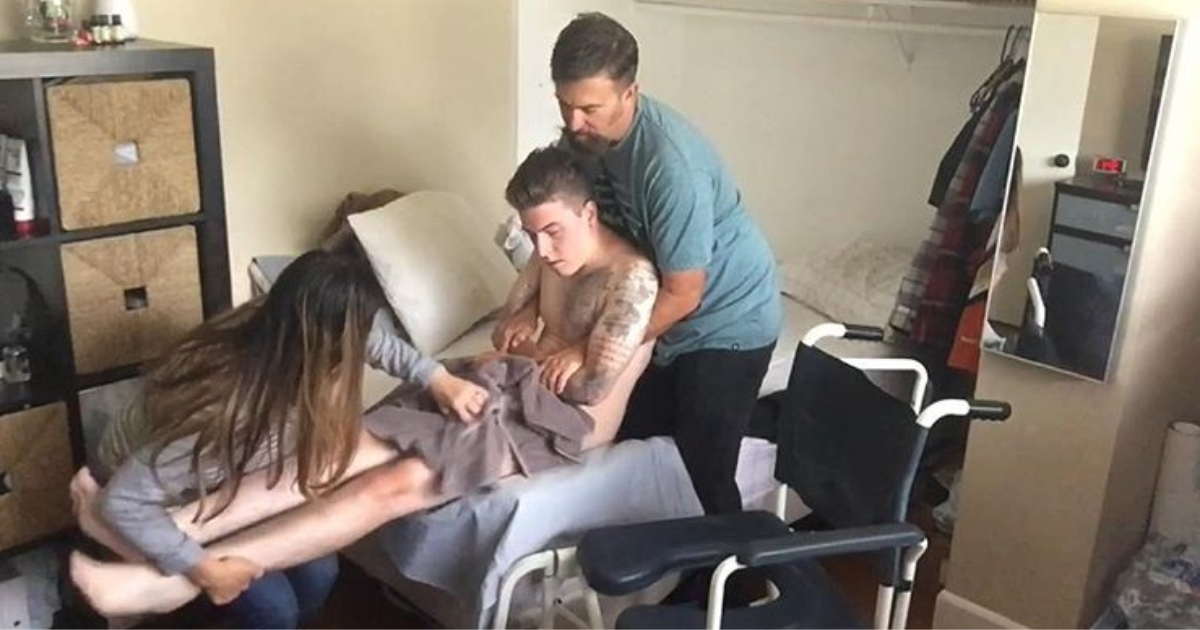 Parents help son with his morning routine