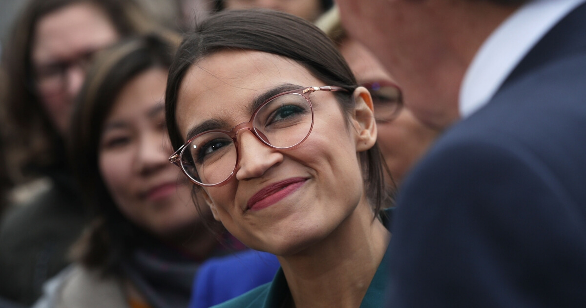 U.S. Rep. Alexandria Ocasio-Cortez speaks during a news conference at the East Front of the U.S. Capitol.