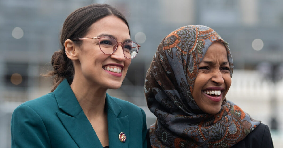 Rep. Alexandria Ocasio-Cortez, Democrat of New York, and Rep. Ilhan Omar, Democrat of Minnesota.