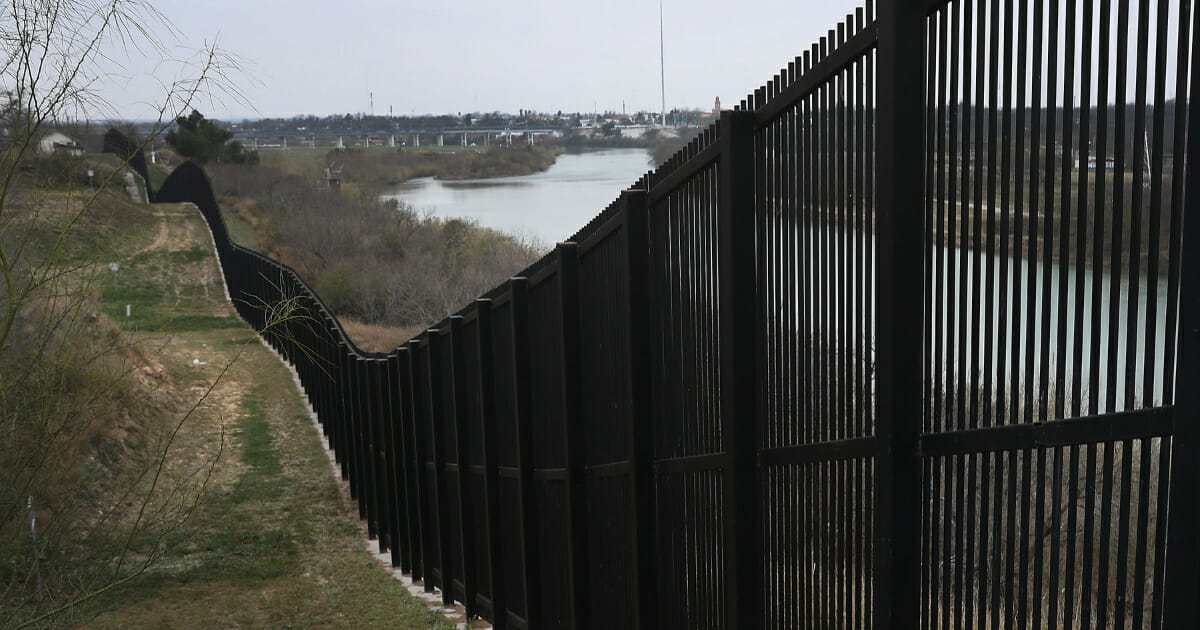A border fence is seen near the Rio Grande which marks the boundary between Mexico and the United States on Feb. 9, 2019, in Eagle Pass, Texas.