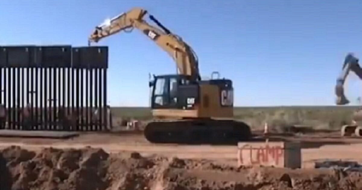 A still shot from a video posted to Twitter by President Donald Trump shows construction of a border wall on the U.S.-Mexico border in New Mexico. (
