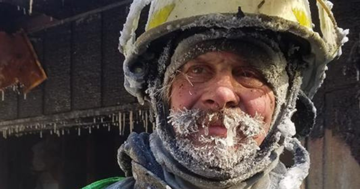 Fire chief covered in snow and ice