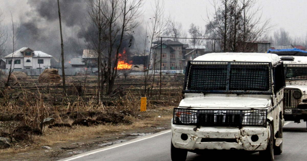 A house in which militants are suspected to have sheltered is in flames after a gunfight happened between rebels and Indian security forces that killed 4 soldiers, in South Kashmir's Pulwama district, some 10 km away from the spot of recent suicide bombing, on February 18, 2019.