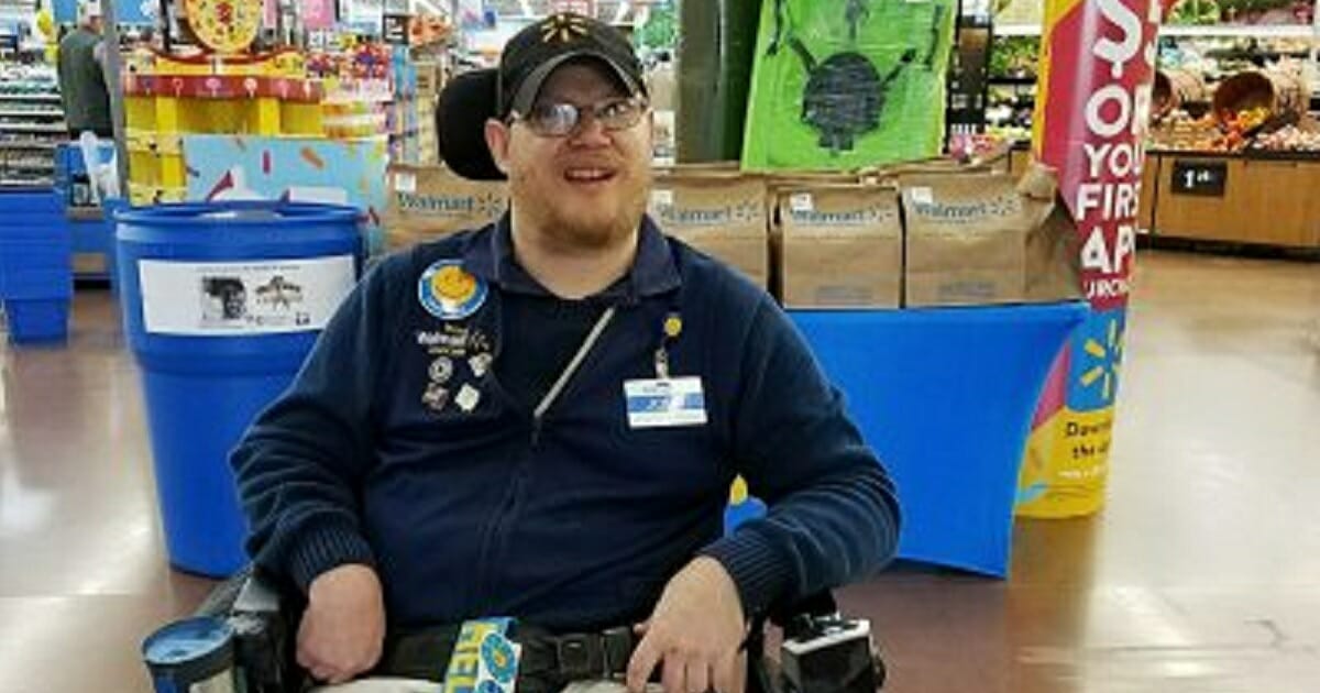 Walmart greeter John Combs works at a Walmart store in Vancouver, Washington.