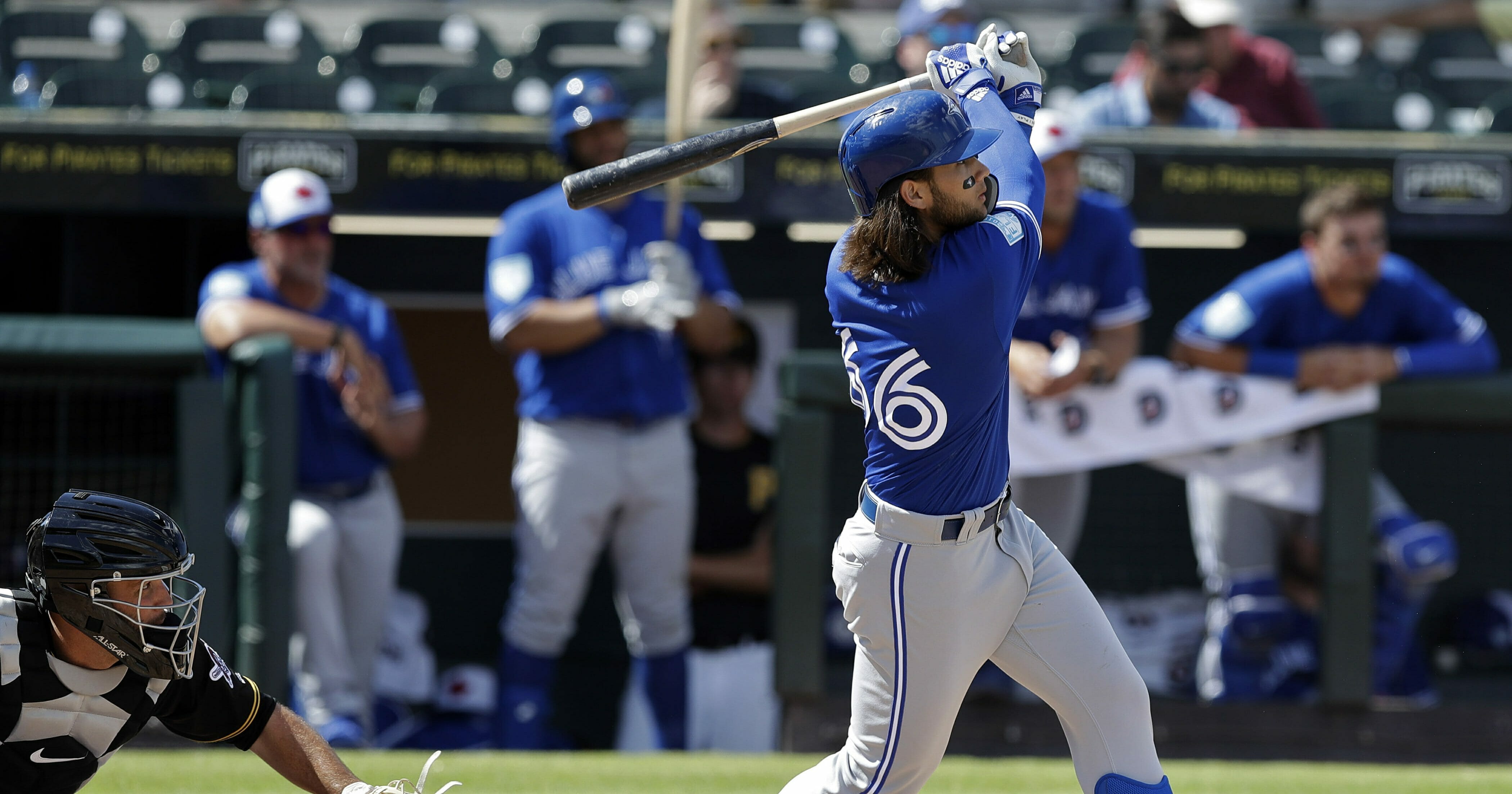 Toronto Blue Jays' Bo Bichette watches his two-run home run off Pittsburgh Pirates relief pitcher Matt Eckelman during the fourth inning of a spring training baseball game Friday, March 8, 2019, in Bradenton, Fla.