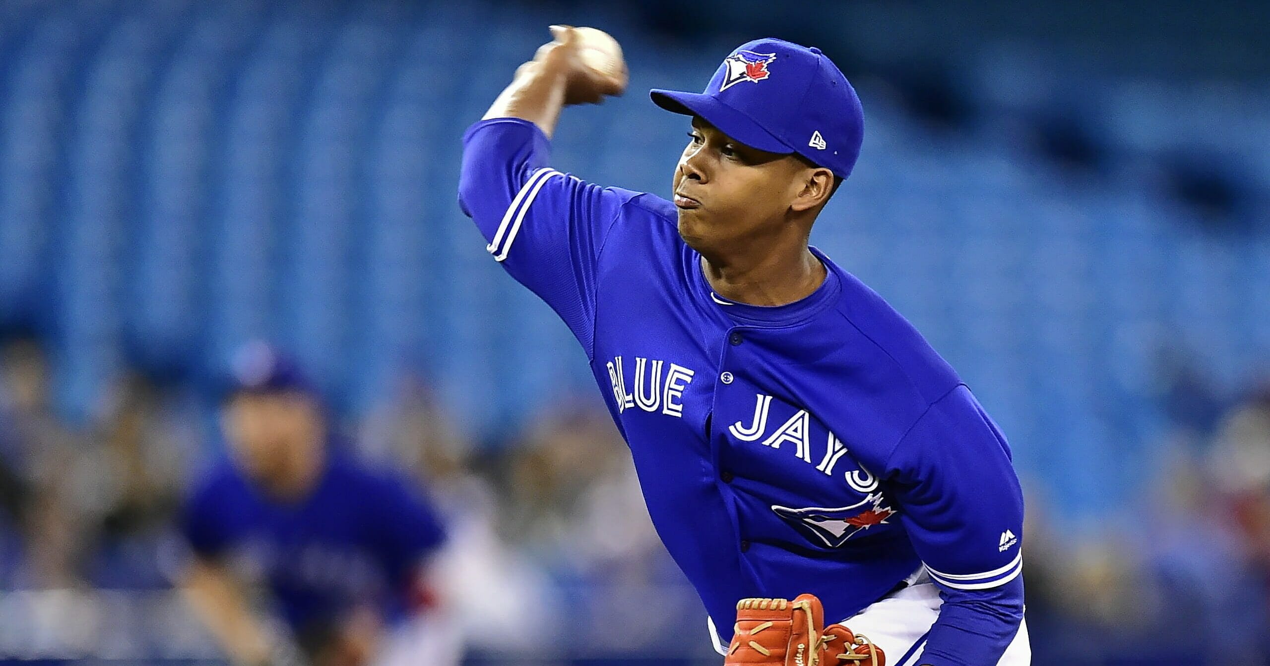 Toronto Blue Jays relief pitcher Elvis Luciano (65) works against the Detroit Tigers during the seventh inning of a baseball game in Toronto on Sunday, March 31, 2019.