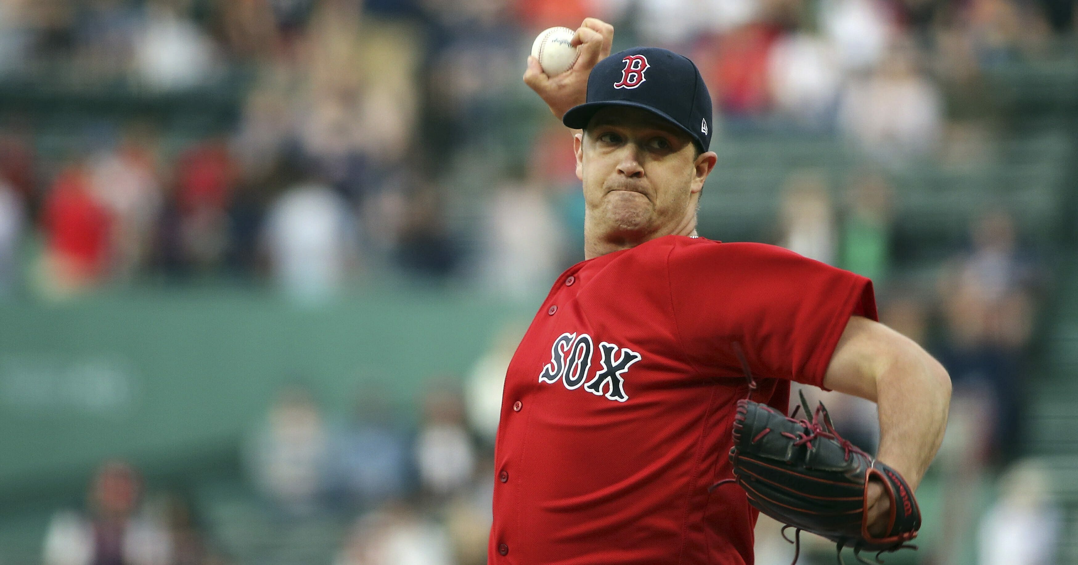 Boston Red Sox starting pitcher Steven Wright delivers to the Seattle Mariners during a June 22, 2018, game at Fenway Park.