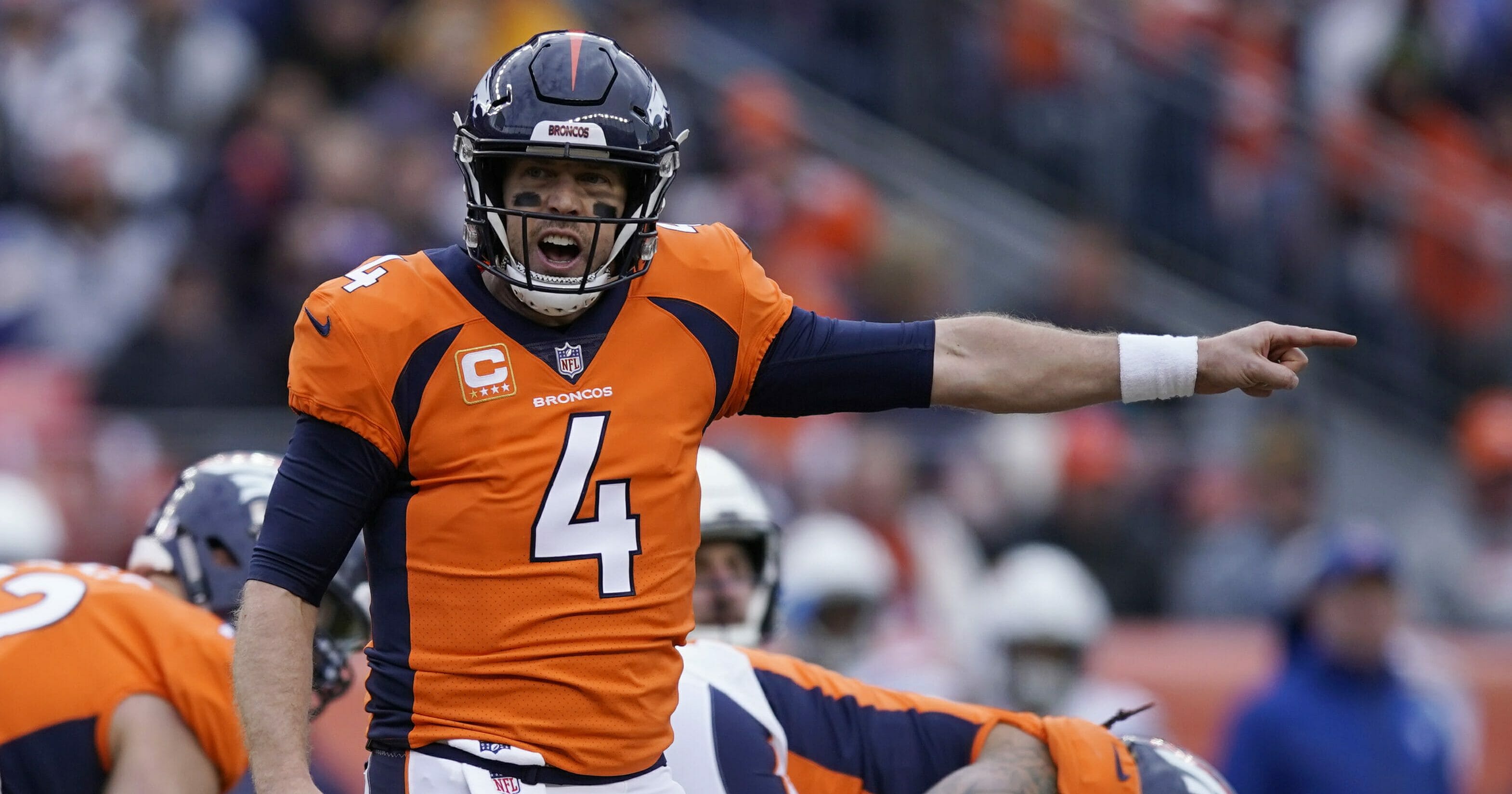 In this Dec. 30, 2018, file photo, Denver Broncos quarterback Case Keenum calls out to teammates during the first half of the team's NFL football game against the Los Angeles Chargers in Denver.