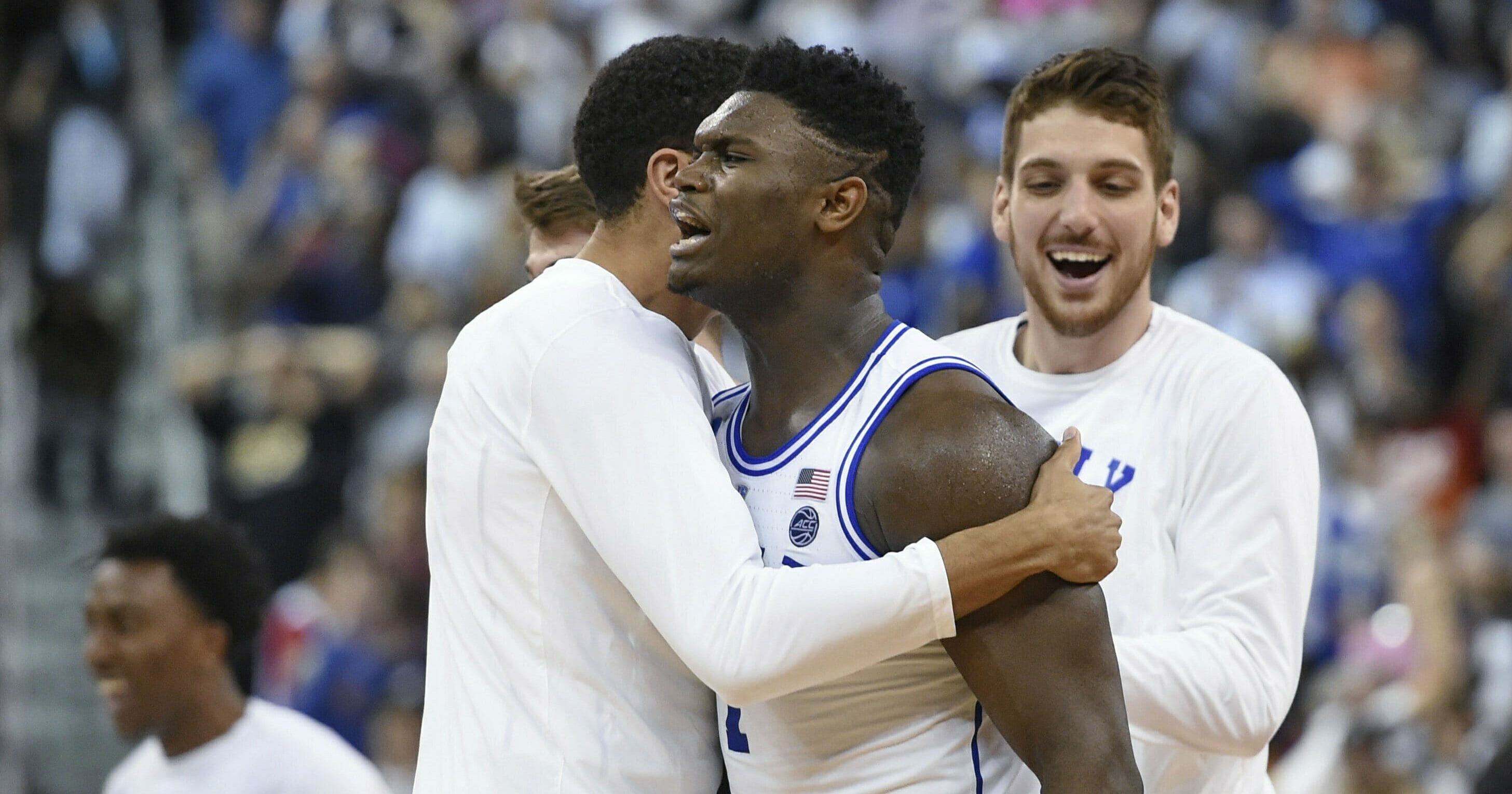 Duke's Zion Williamson, center, celebrates the team's 77-76 win over Central Florida in a second-round men's college basketball game in the NCAA Tournament in Columbia, S.C., Sunday, Mar. 24, 2019.