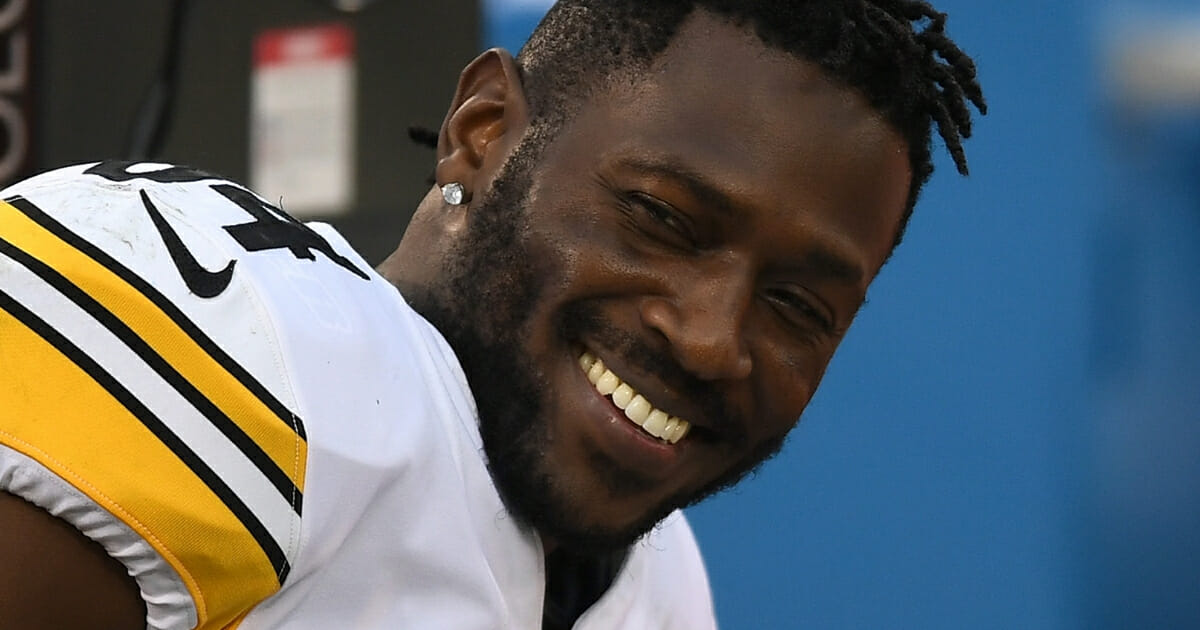Antonio Brown of the Pittsburgh Steelers looks on from the sidelines during a Dec. 9, 2018, game against the Oakland Raiders at Oakland-Alameda County Coliseum.
