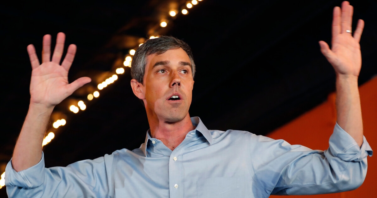Former Texas congressman Beto O'Rourke speaks to residents during a stop at the Central Park Coffee Company on Friday, March 15, 2019, in Mount Pleasant, Iowa.