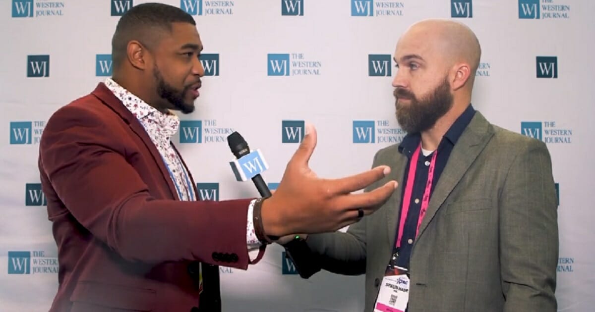 Brandon Tatum, a former Tuscon, Arizona, police officer who is now director of urban engagement for Turning Point USA, talks to Shaun Hair, executive editor of The Western Journal, at the Conservative Political Action Conference last week in National Harbor, Maryland.