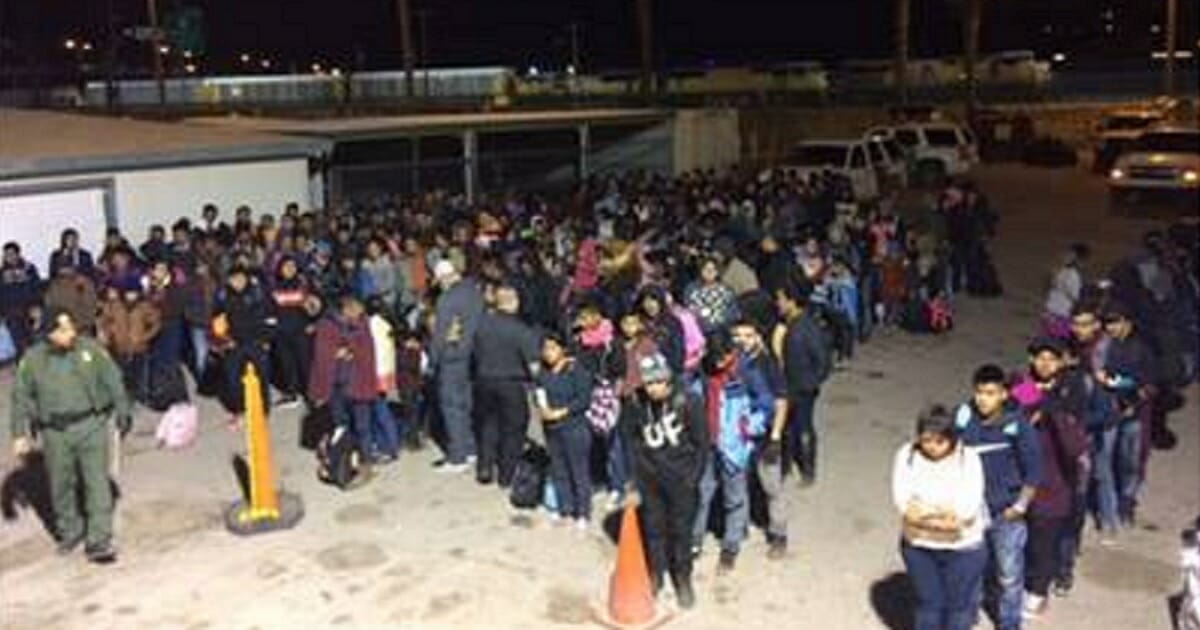 Large numbers of Customs and Border Protection detainees line up in Texas.