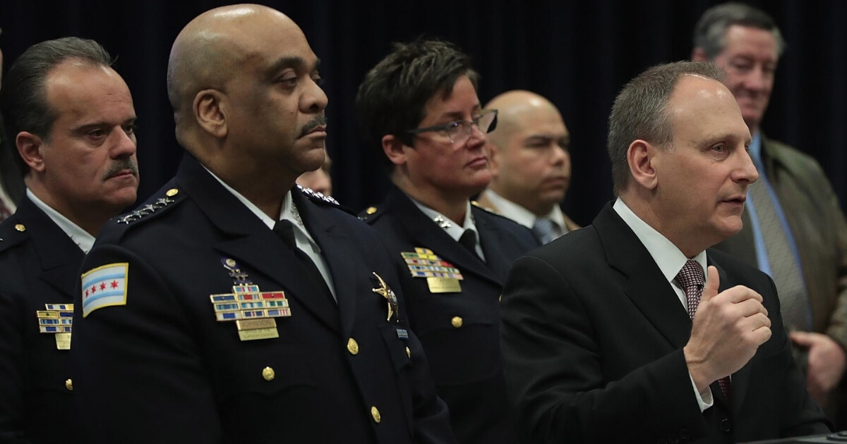 Chicago law enforcement officers hold a news conference Feb. 21, 2019, in Chicago.