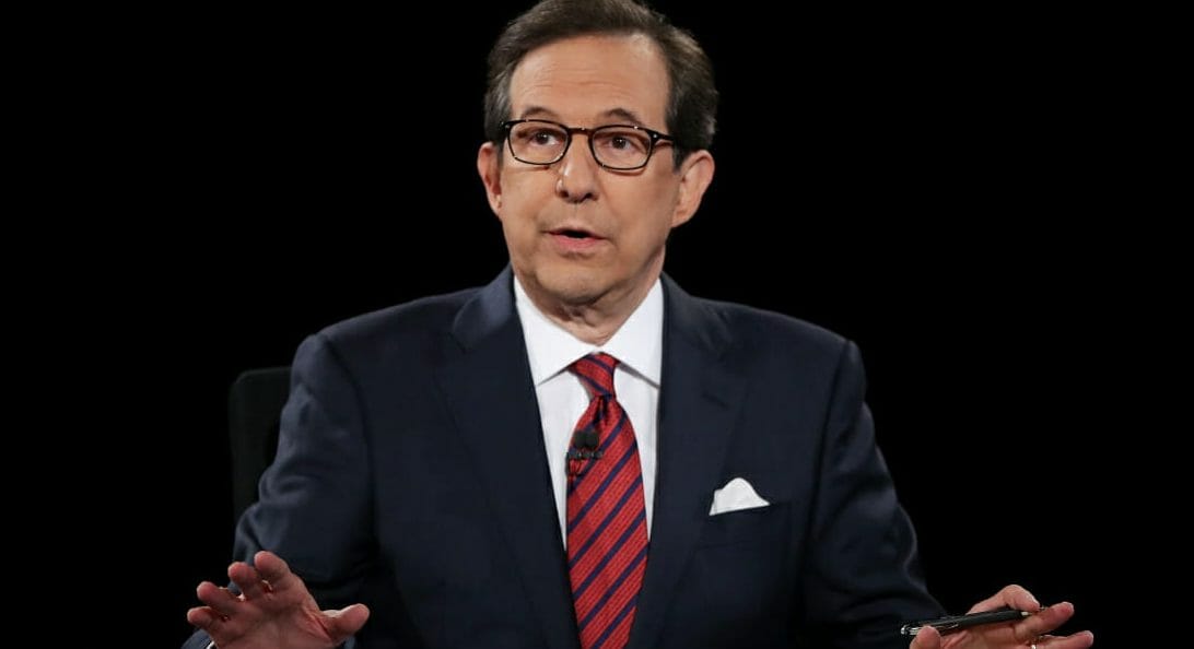 Fox News anchor and moderator Chris Wallace asks a question during the third U.S. presidential debate at the Thomas & Mack Center on October 19, 2016, in Las Vegas, Nevada.