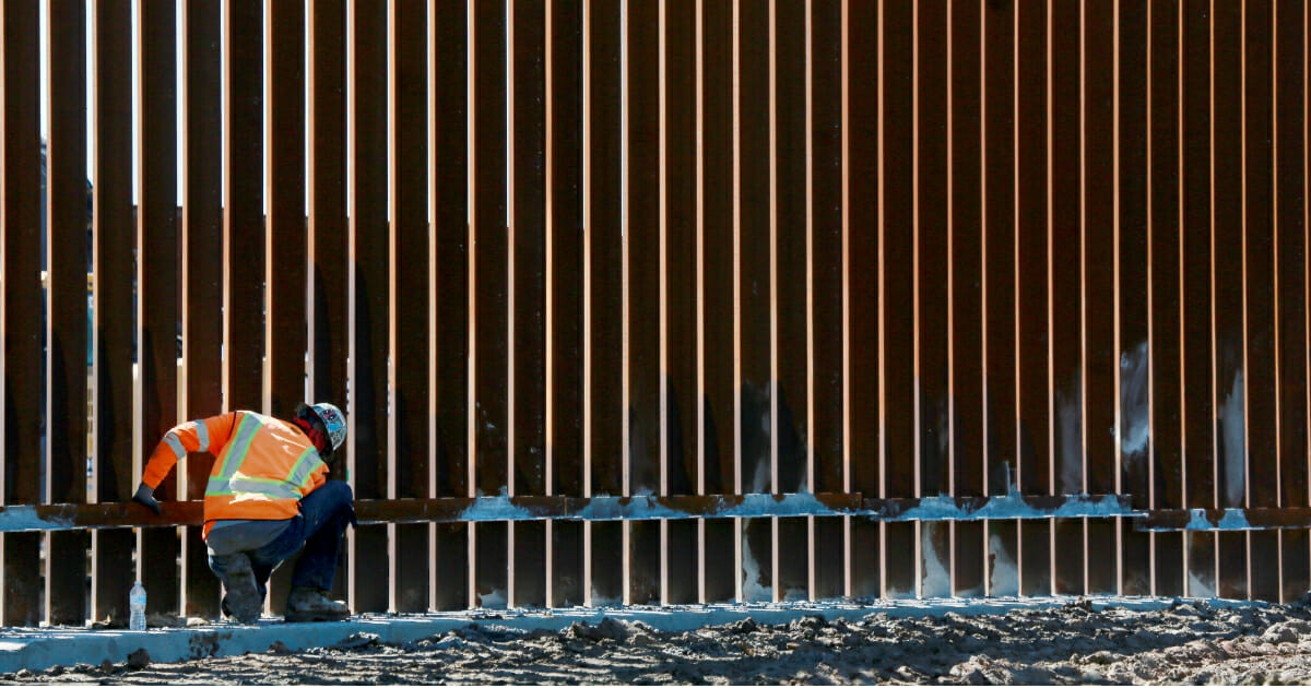 A construction worker builds a secondary wall along the U.S.-Mexico border in Otay Mesa, California, on Feb. 22, 2019