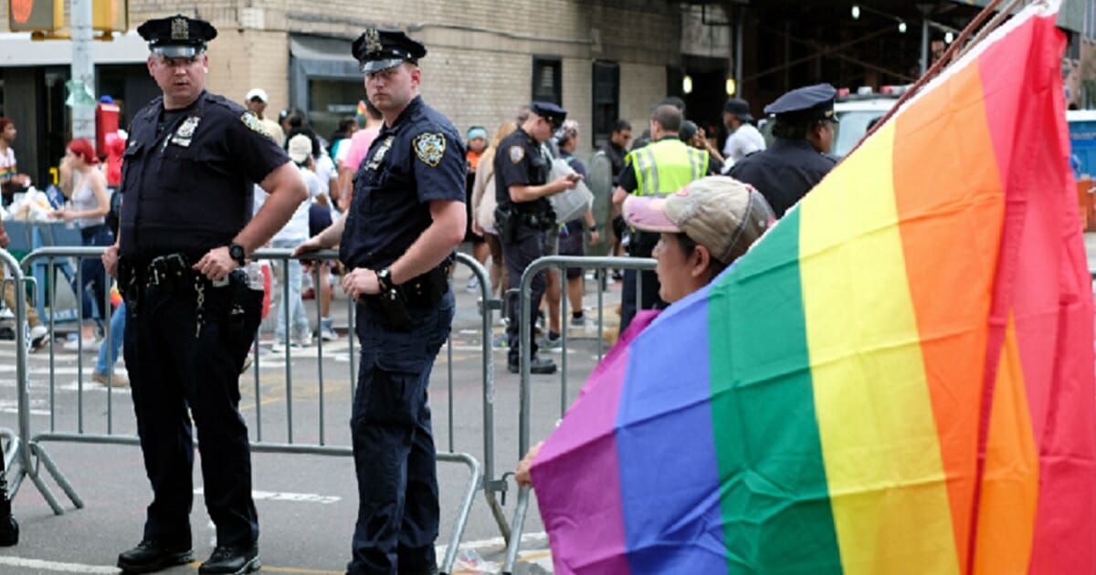 Police officer stand guard for the Gay Pride Parade in New York City in June.