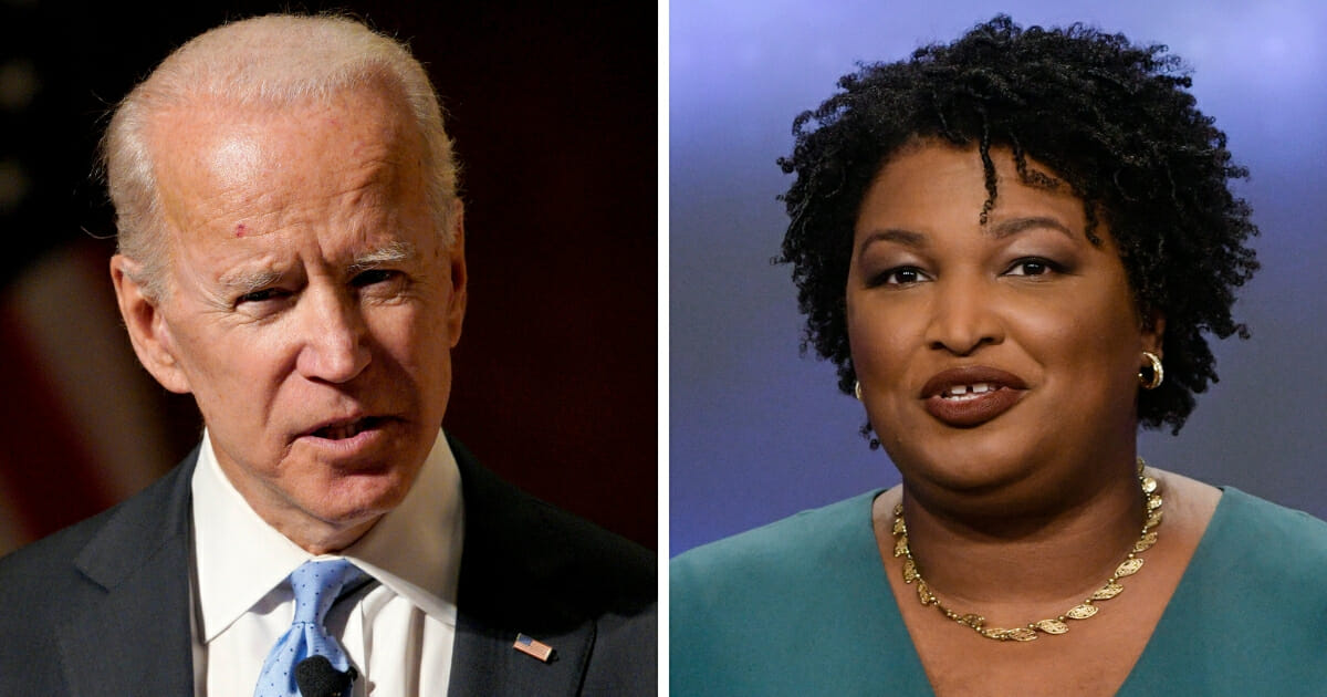 Former Vice President Joe Biden, left, and former Georgia state lawmaker Stacey Abrams, right, met in Washington on March 14, 2019