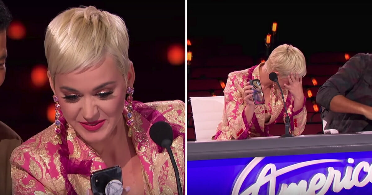 Katy Holds Contestant's Phone