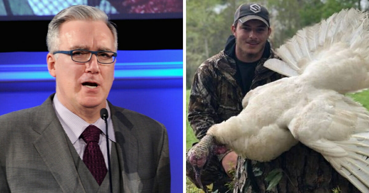 ESPN's Keith Olbermann, left, and Hunter Waltman, right, with the turkey he shot.