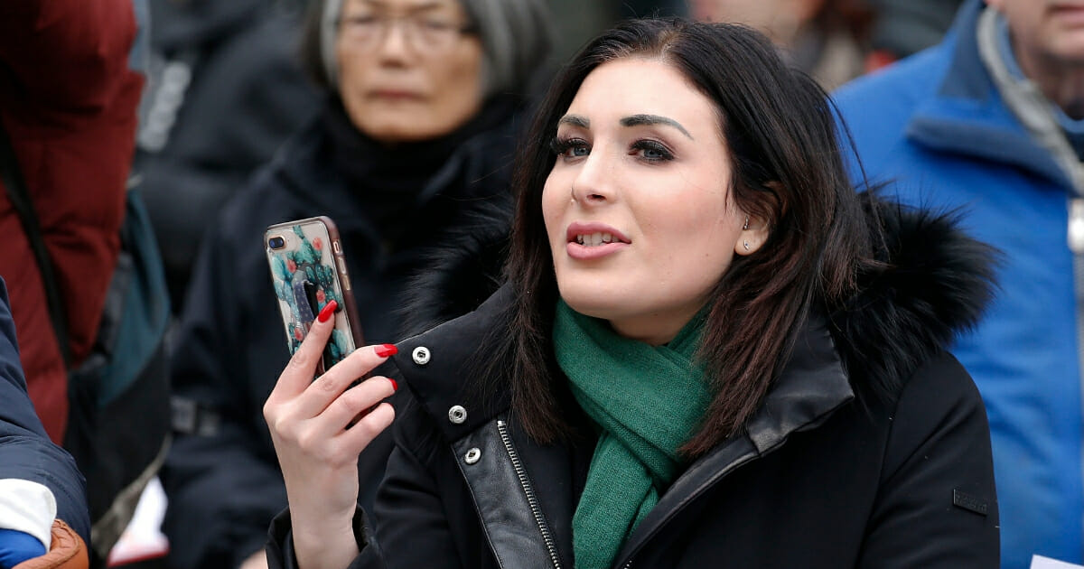 Political activist Laura Loomer stands across from the Women's March 2019 in New York City on Jan. 19, 2019, in New York City.Political activist Laura Loomer stands across from the Women's March 2019 in New York City on Jan. 19, 2019, in New York City.