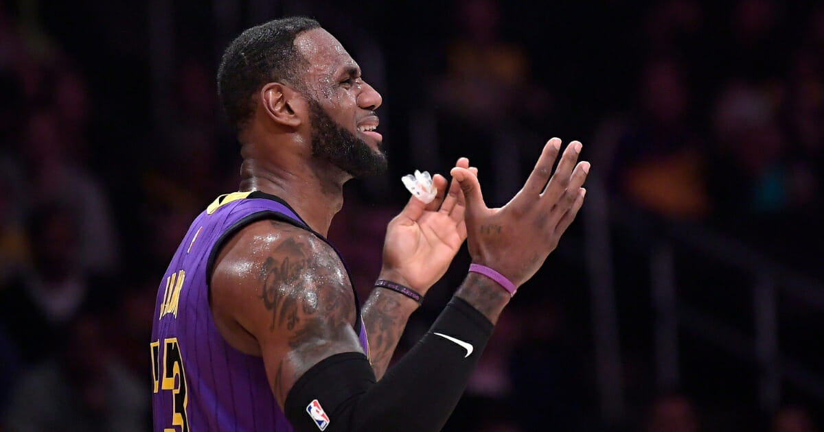 Los Angeles Lakers forward LeBron James reacts after being called for a foul during a game against the Brooklyn Nets on March 22, 2019, in Los Angeles.