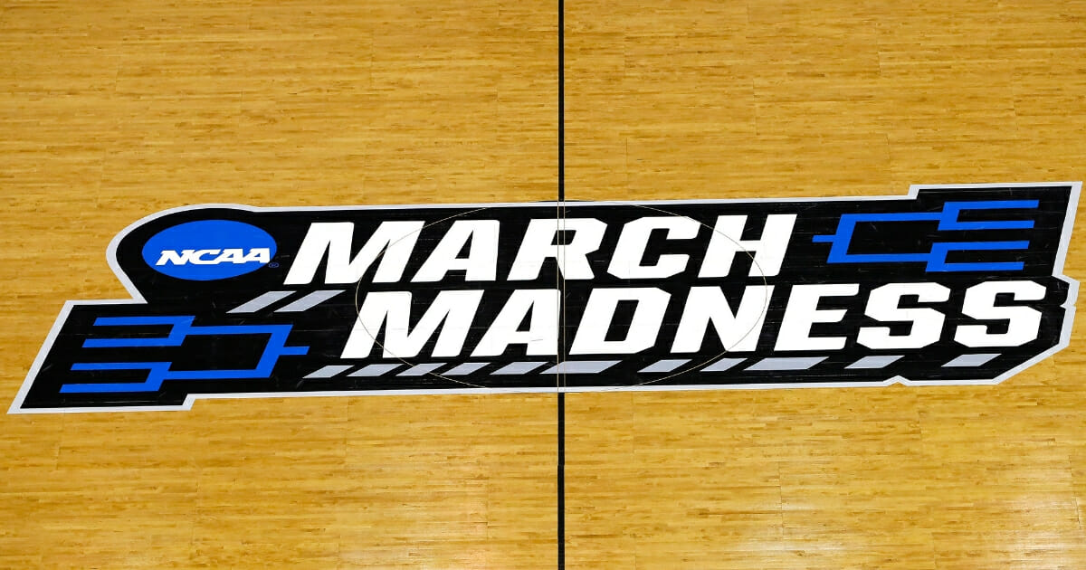 The NCAA's March Madness logo is seen on the court at Colonial Life Arena in Columbia, South Carolina on March 22, 2019.