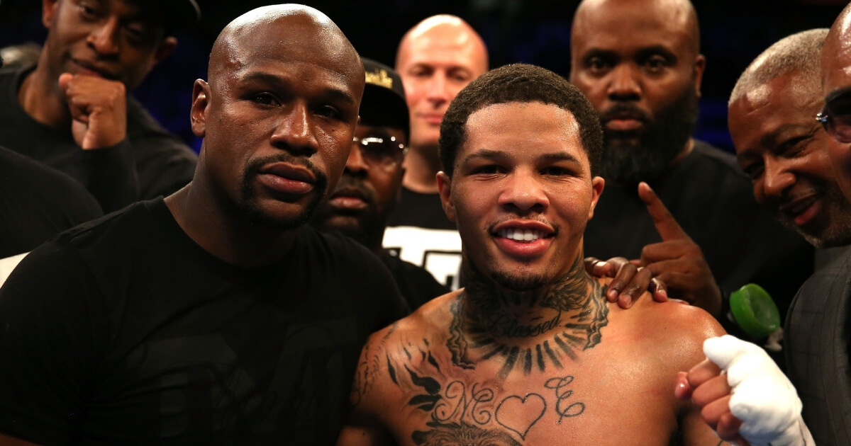 Floyd Mayweather Jr., left, celebrates with Gervonta Davis, right, after Davis' victory against Liam Walsh at Copper Box Arena in London on May 20, 2017.