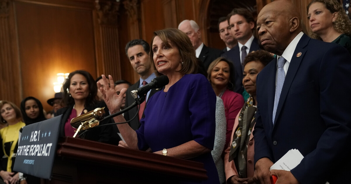 Nancy Pelosi and House Democrats introduce HR 1 at a media conference on Jan. 4.