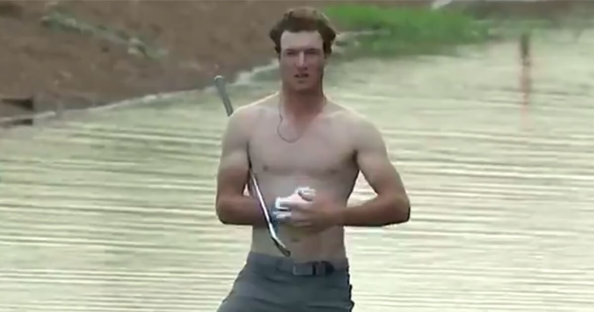 Golfer Drew Nesbitt took off his shirt to hit a ball out of the water