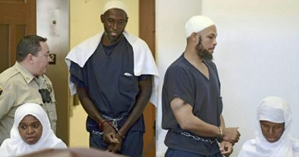 Four of five defendants in the case of a compound in New Mexico raided last year are pictured in a file photo from August 2018. From left: Jany Leveille, Lucas Morton, Siraj Ibn Wahhaj and Subbannah Wahhaj.