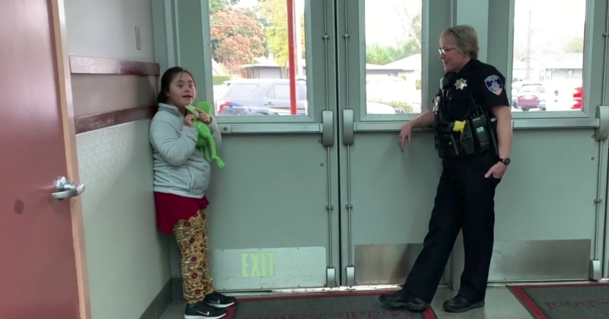 Officer Calms Student with Song