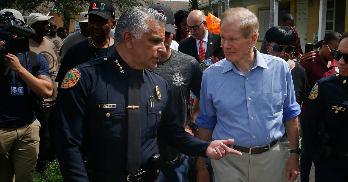 City of Miami Police Chief Jorge Colina and Sen. Bill Nelson in Miami on Friday, July 6, 2018.