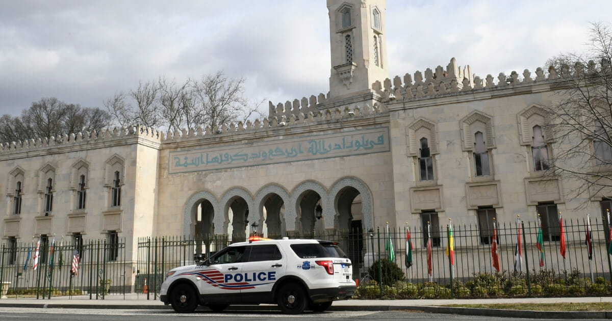 A police vehicle is parked outside the Islamic Center of Washington, on March 15, 2019.
