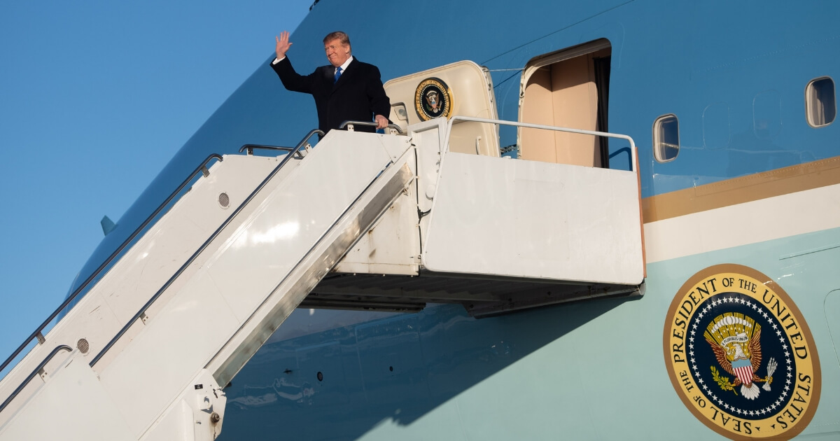 President Donald Trump disembarks from Air Force One upon arrival at Joint Base Elmendorf-Richardson in Anchorage, Alaska, on Feb. 28, 2019.