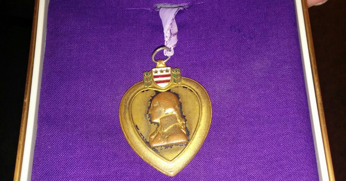 A Purple Heart medal that had been found along a Rockland County road several years ago is displayed July 23, 2017, at a news conference in New York.