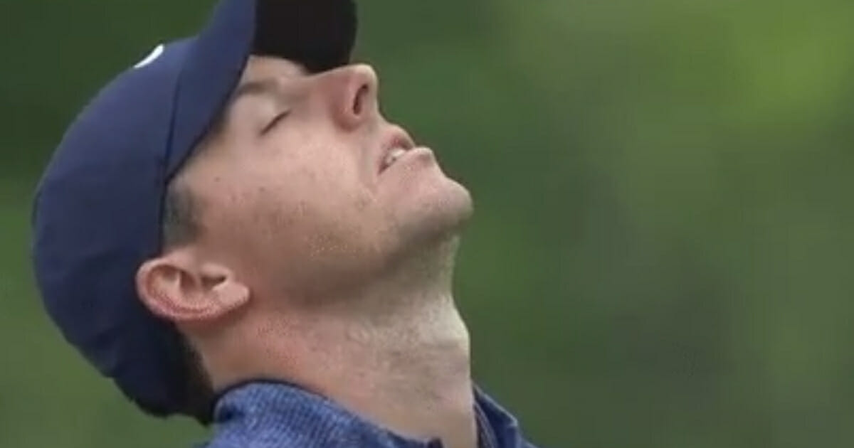 Rory McIlroy's expression says it all in his match play loss to Tiger Woods.