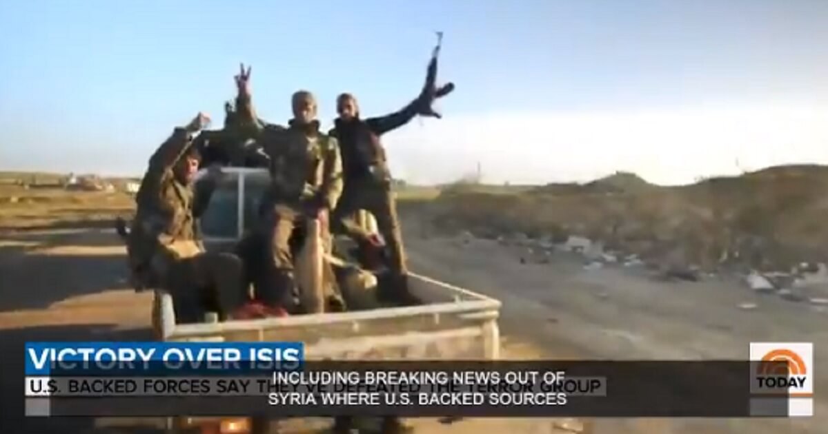 Flashing a "v for victory" sign, fighters for the Syrian Democratic Forces celebrate the end of the Islamic State group's "caliphate" in a video reposted by Donald Trump Jr.