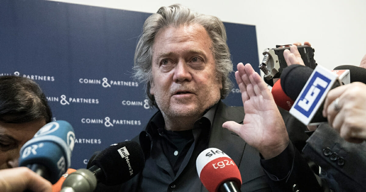 Steve Bannon talks to media members March 25, 2019, in Rome, Italy.