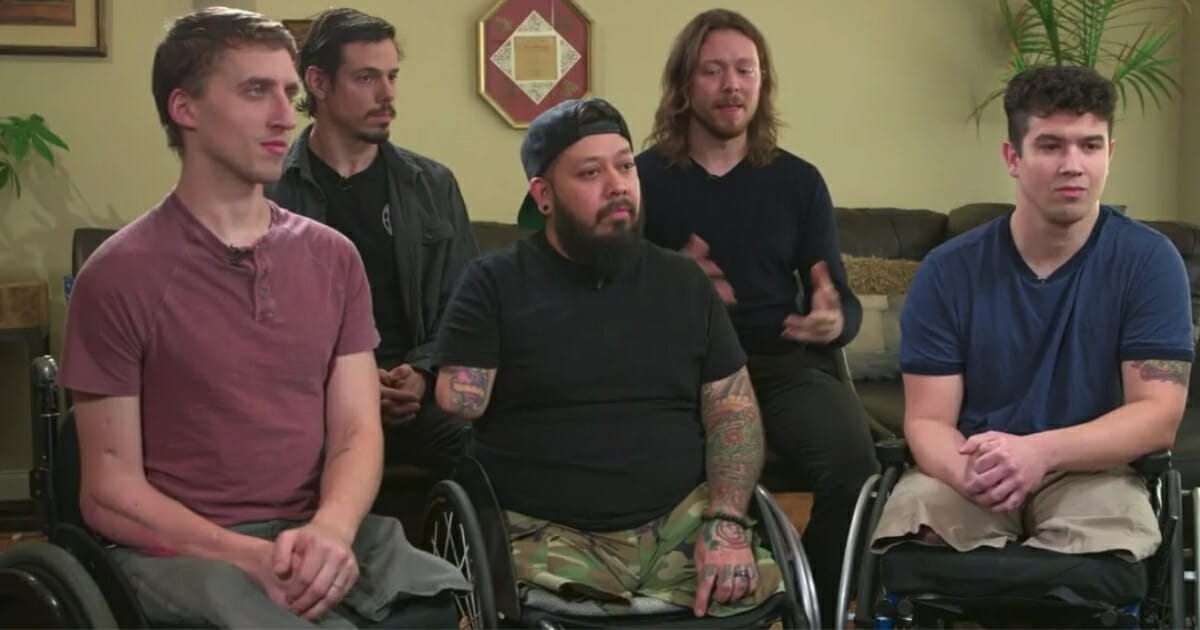 Five men who are in a band and have all lost limbs.