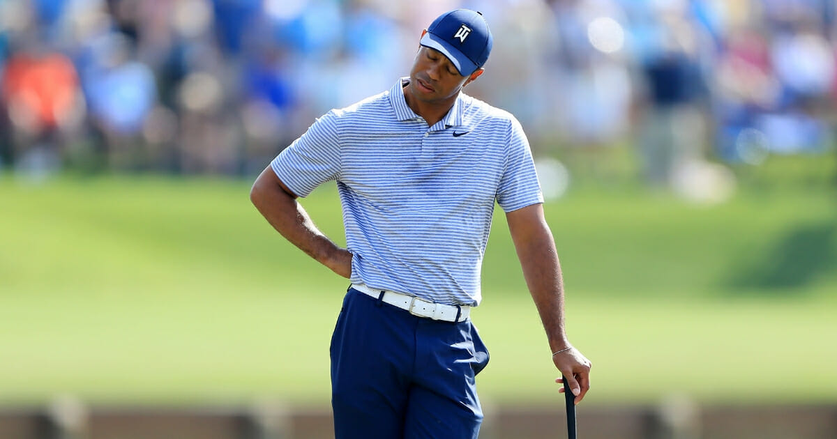Tiger Woods reacts after a quadruple bogey on the 17th hole at TPC Sawgrass in Ponte Vedra Beach, Florida, on March 15, 2019.