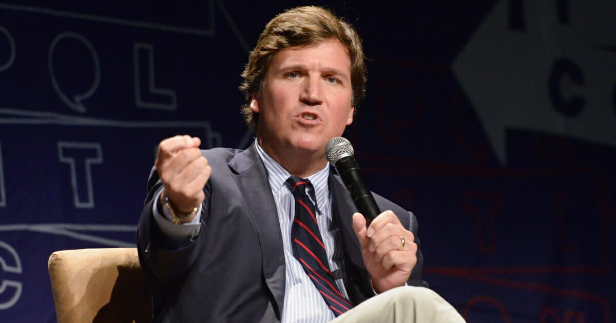 Political commentator Tucker Carlson speaks during Politicon 2018 on October 21 in Los Angeles, California.