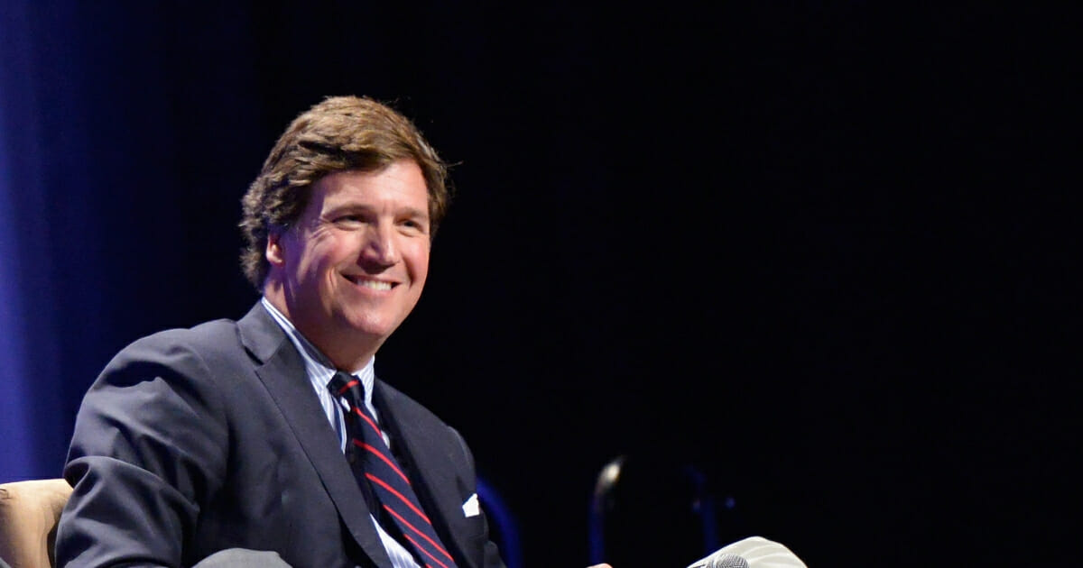 Political commentator Tucker Carlson speaks during Politicon 2018 at Los Angeles Convention Center on October 21, 2018.