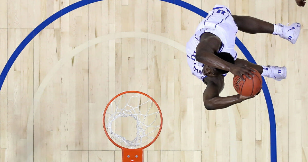 Zion Williamson of the Duke Blue Devils dunks the ball against the Syracuse Orange during their game in the quarterfinal round of the 2019 Men's ACC Basketball Tournament at Spectrum Center on Mar. 14, 2019 in Charlotte, North Carolina.