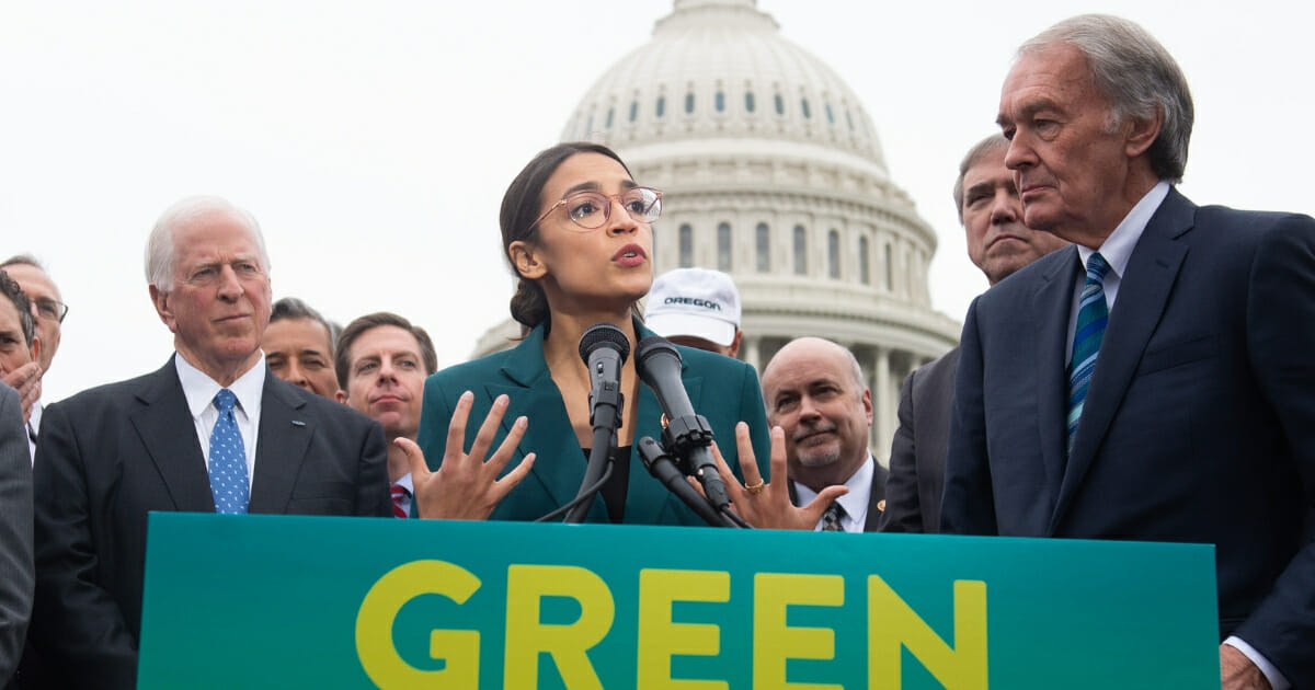 Rep. Alexandria Ocasio-Cortez, Democrat of New York, and U.S. Sen. Ed Markey, Democrat of Massachusetts, speak during a news conference to announce Green New Deal.